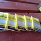 ExtraTime Plaster Retarder sachets arranged on a wooden surface, designed to extend plaster setting times.